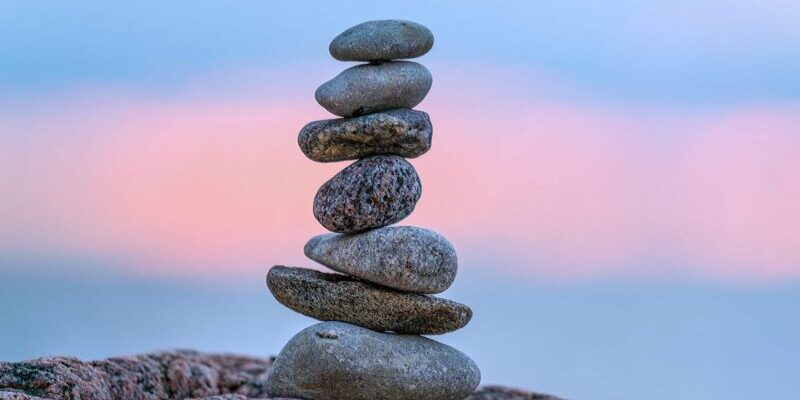 A small cairn placed on a rock at sunset Gastroparesis Diagnostics: The Story Behind Cairn Diagnostics